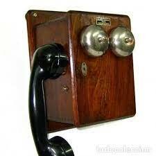 Telefon Espanyol de paret de fusta