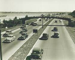 Interstate highway system begins with the signing of the Federal-Aid Highway Act.