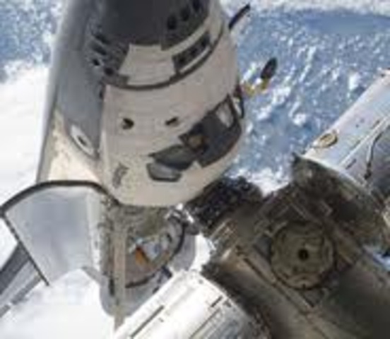 Space shuttle Atlantis docks on ISS