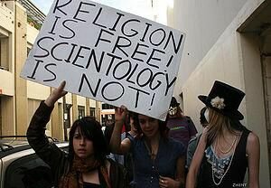 The IRS settles its 40-year battle with Scientology, recognizing it as a tax-exempt church.