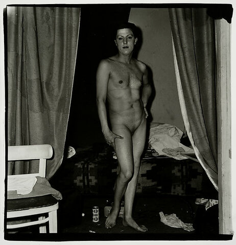 A naked man being a woman