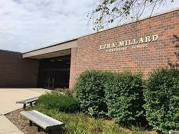 había ido a la Ezra Elementary School a con mi hermano