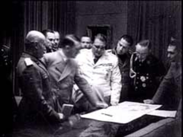 Britain’s Neville Chamberlain and Hitler meet at the Munich Conference