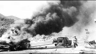 Rómulo Betancourt sufrió un atentado en Los Próceres, estallando una bomba cerca de su vehículo.