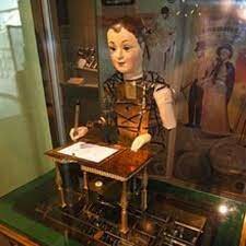 Muñeca Mecanica