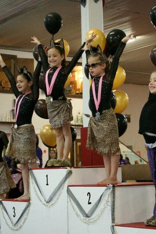 started competing gymnastics