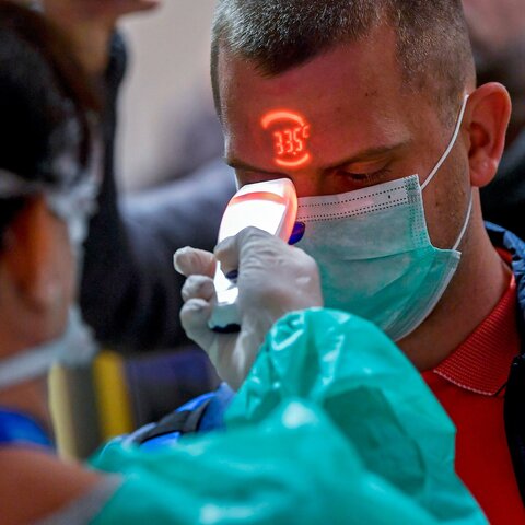 China begins communicating with the WHO about the new strain of pneumonia from an unknown origin.