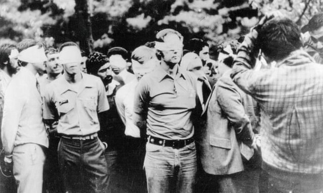 Fifty-two American hostages held in Iran released.