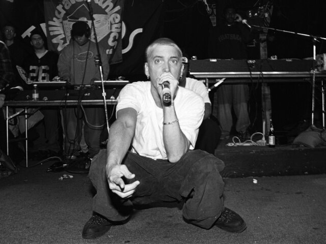 Eminem faces controversy and opens up debate about hip-hop and racism after being caught using the N-word