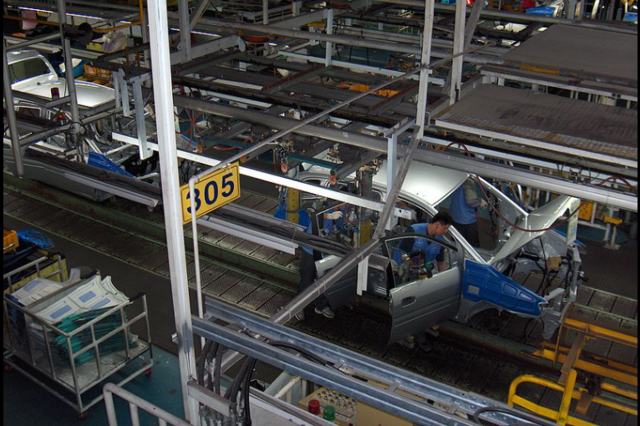 Línea de ensamble -  Ransom Olds,  Henry Ford