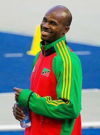 Record de 100m Masculinos (10,00 s +0,4 w) por Kim Collins (San Cristóbal y Nieves)