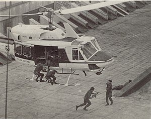 The seizure of the courthouse in Colombia by M-19 rebels.