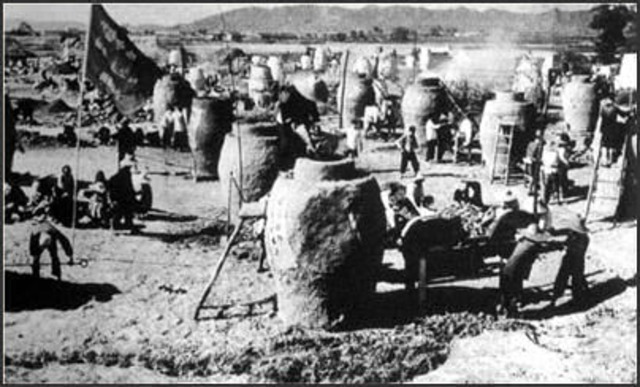 Mao broke with the Soviet model and announced a new economic program, the "Great Leap Forward,"