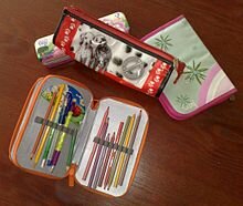 aparición de estuches