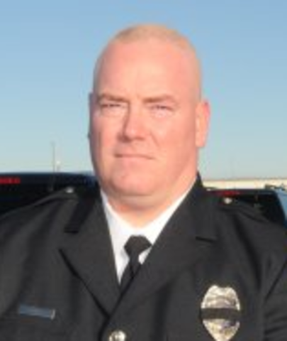 Sergeant Bill Judd creates a cartoon.