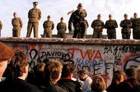 Berlin Wall falls (Reagan feels its U.S.'s greatest accomplishment of the era)