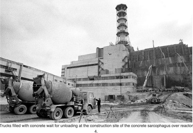 A concrete roof (“sarcophagus”) is completed over the fourth reactor.