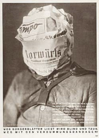 Cualquiera que lea periódicos burgueses  se convierte en ciegos y sordos:  ¡Fuera con estos vendajes embrutecedor!,  John Heartfield