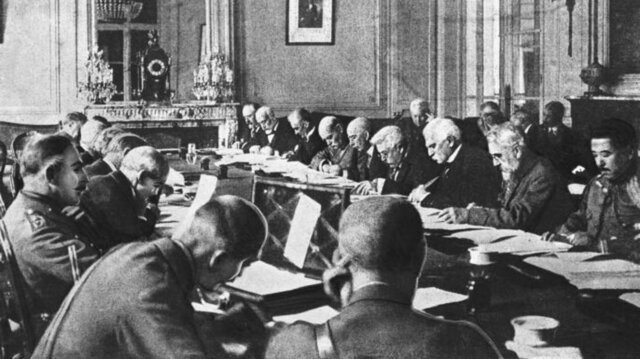 Allied and German representatives sign treaty of Versailles.