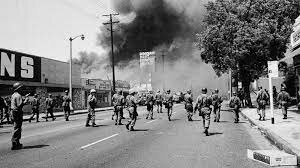Riots break out in the African American community of Watts, California.