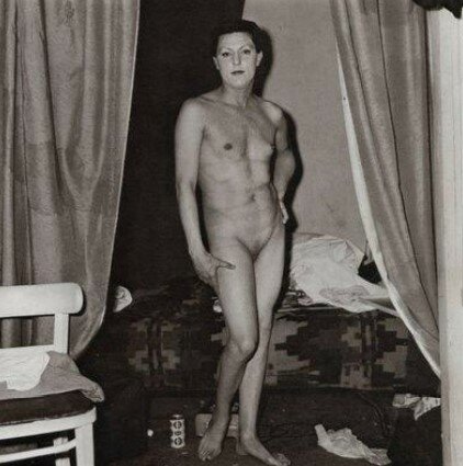 A naked man being a woman