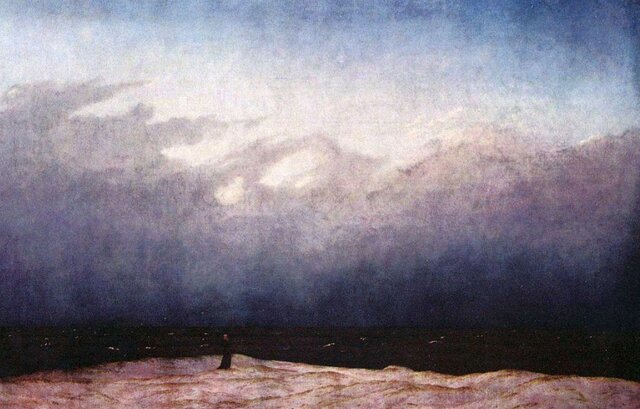 Monje a la orilla del mar