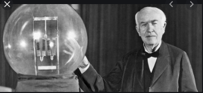 Edison invents electric light bulb