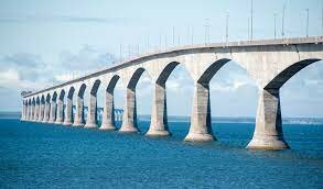 Confederation bridge opens up and links Prince Edward Island to the mainland
