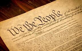 Samuel Adams signs the Constitution