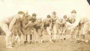 The Football Huddle was invented