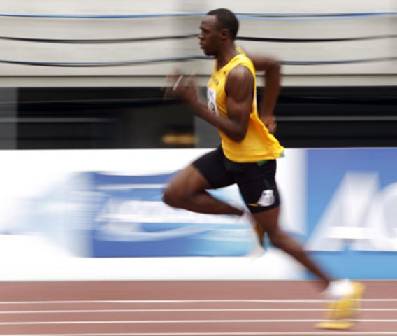 Usain Bolt breaks world record