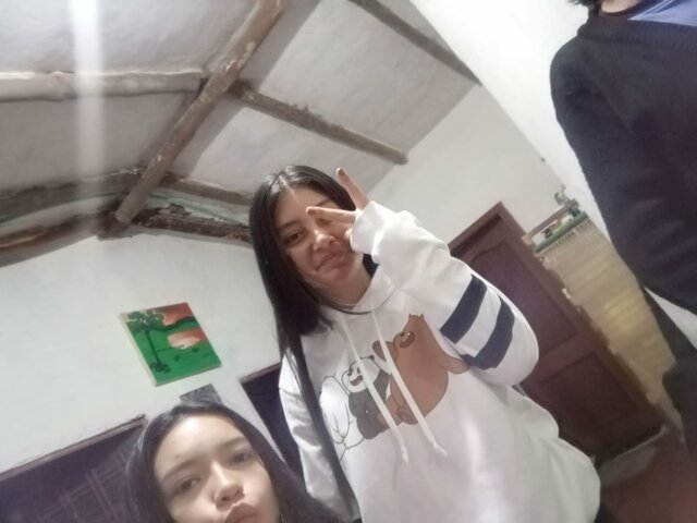 con mi prima en el cumpleaños de mi mama