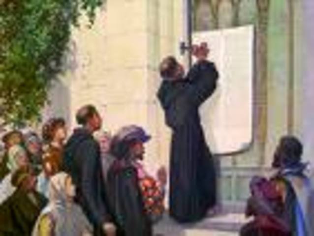martin luthers nails 95 theses to the door of the wittenburg all saints church