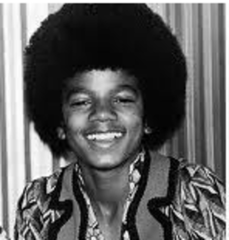 "Off the wall" album propels him to superstar status.