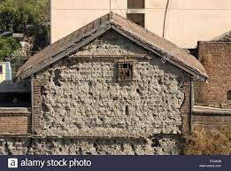 People in Greece live in houses of brick and plaster with tiled roofs