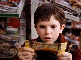 Charlie gets the golden ticket, sweet shop