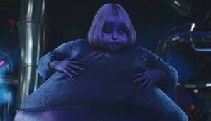 Violet gets turned into a blueberry,  inside the chocolate factory
