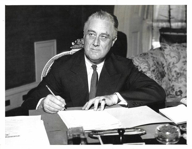 Wins first full term as President