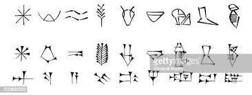 Written language -or something similar- appears