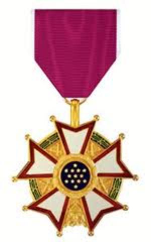 Wins Legion of Merit