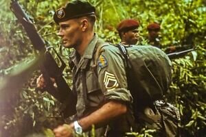 President Kennedy send 400 Green Berets to Vietnam