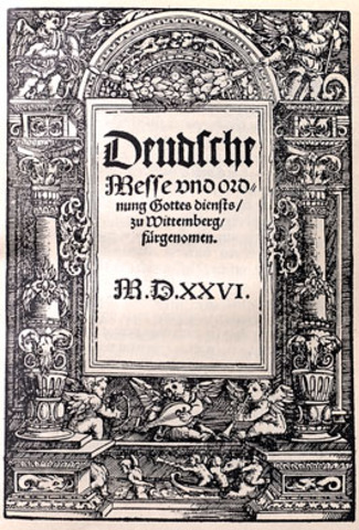 Martin Luther starts using German language in the mass