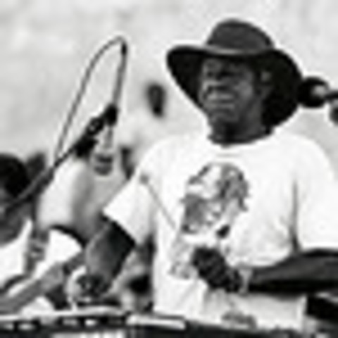 Luigi Waites on the stage.