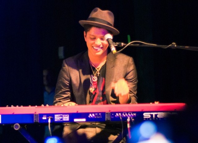 bruno mars plays the piano bass guitar on november 24,2010