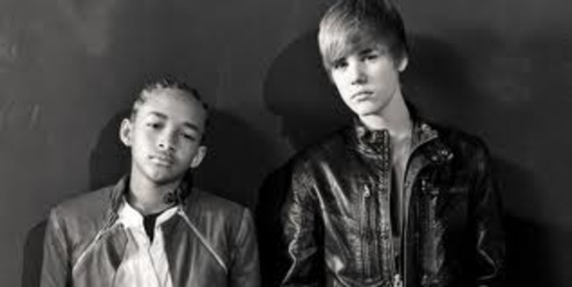 Jaden comes along with Justin Bieber and has his own rap solo in the song Never Say Never, the rapping comes from his dad Will also