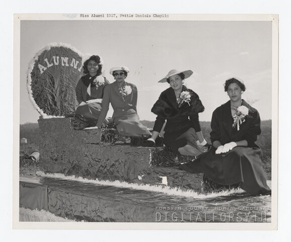 Miss Alumni Hattie Daniels Chaplin riding in the parade