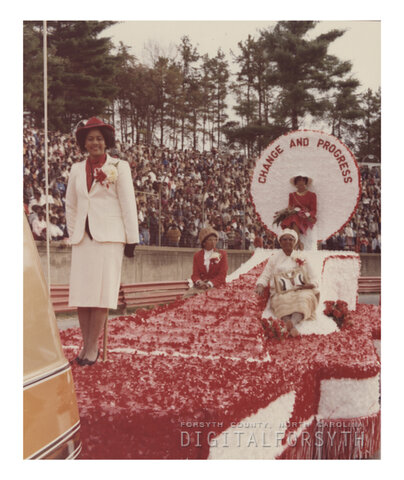 Miss Alumni Sandra J. Deberry riding on a float