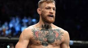 Conor McGregor gets his famous chest tattoo