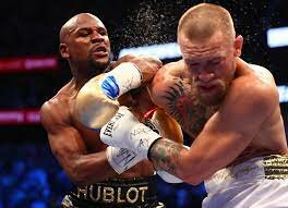 Conor McGregor fights Floyd Mayweather