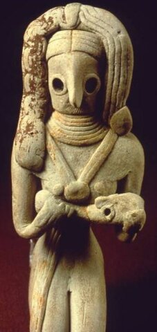 Statuette de femme allaitant son enfant